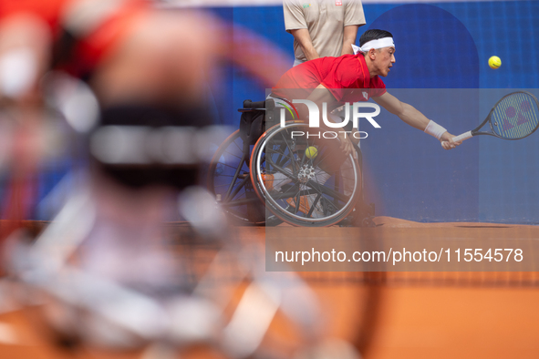 Tokito Oda of Japan competes in the Wheelchair Tennis Men's Singles Gold Medal Match against Alfie Hewett of the UK on Court Philippe Chatri...