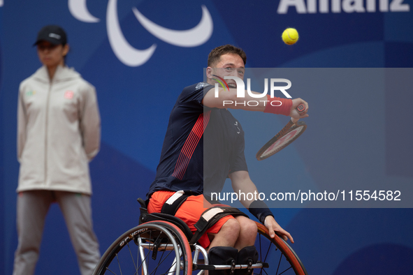 Alfie Hewett of the UK competes during the Wheelchair Tennis Men's Singles Gold Medal Match against Tokito Oda of Japan on Court Philippe Ch...