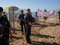 Dozens of Barcelona residents protest on the Somorrostro beach in the Barceloneta neighborhood against the America's Cup 2024, in Barcelona,...