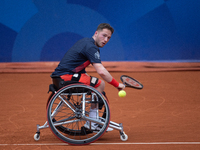 Alfie Hewett of the UK competes during the Wheelchair Tennis Men's Singles Gold Medal Match against Tokito Oda of Japan on Court Philippe Ch...