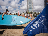 Dozens of Barcelona residents protest on the Somorrostro beach in the Barceloneta neighborhood against the America's Cup 2024, in Barcelona,...