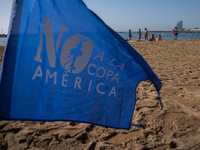 Dozens of Barcelona residents protest on the Somorrostro beach in the Barceloneta neighborhood against the America's Cup 2024, in Barcelona,...