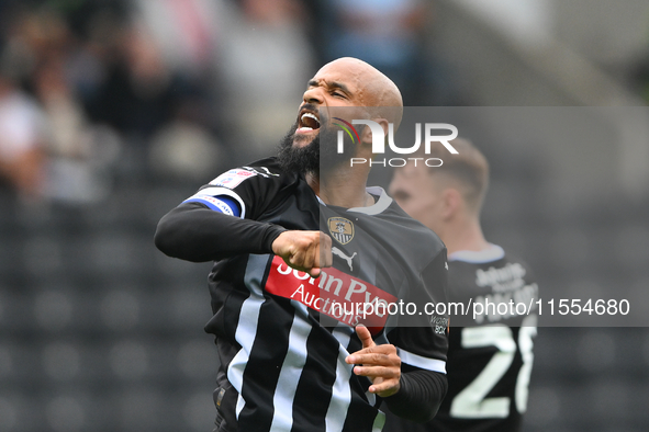 David McGoldrick of Notts County punches the air after scoring a goal to make it 2-0 during the Sky Bet League 2 match between Notts County...