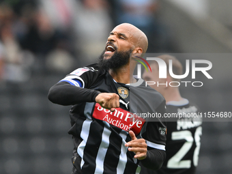 David McGoldrick of Notts County punches the air after scoring a goal to make it 2-0 during the Sky Bet League 2 match between Notts County...