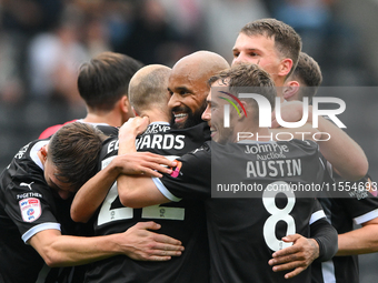 David McGoldrick of Notts County celebrates with teammates after scoring a goal to make it 2-0 during the Sky Bet League 2 match between Not...