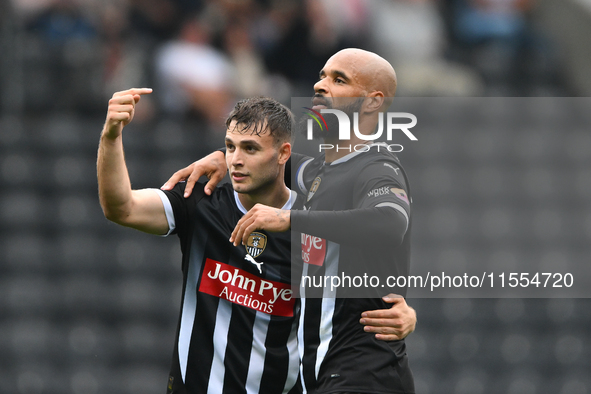 David McGoldrick of Notts County celebrates with Nicholas Tsaroulla of Notts County after scoring a goal to make it 2-0 during the Sky Bet L...