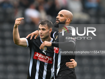 David McGoldrick of Notts County celebrates with Nicholas Tsaroulla of Notts County after scoring a goal to make it 2-0 during the Sky Bet L...