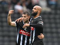 David McGoldrick of Notts County celebrates with Nicholas Tsaroulla of Notts County after scoring a goal to make it 2-0 during the Sky Bet L...