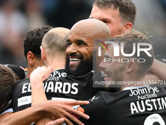 David McGoldrick of Notts County celebrates with teammates after scoring a goal to make it 2-0 during the Sky Bet League 2 match between Not...