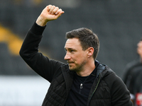 Stuart Maynard, manager of Notts County, celebrates victory during the Sky Bet League 2 match between Notts County and Accrington Stanley at...