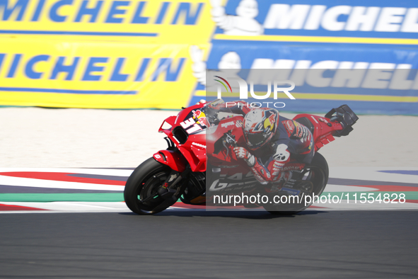 Ducati Spanish rider Jorge Martin rides ahead of Ducati Italian rider Francesco Bagnaia during the sprint race of the San Marino MotoGP Gran...