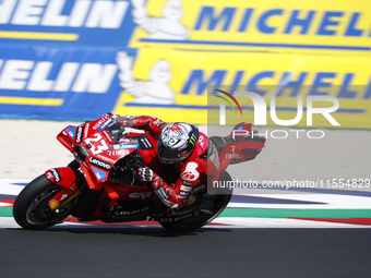 Ducati Spanish rider Jorge Martin rides ahead of Ducati Italian rider Francesco Bagnaia during the sprint race of the San Marino MotoGP Gran...