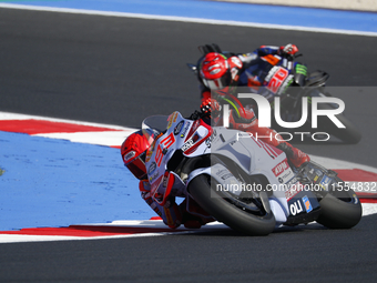 Ducati Spanish rider Jorge Martin rides ahead of Ducati Italian rider Francesco Bagnaia during the sprint race of the San Marino MotoGP Gran...