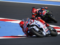 Ducati Spanish rider Jorge Martin rides ahead of Ducati Italian rider Francesco Bagnaia during the sprint race of the San Marino MotoGP Gran...