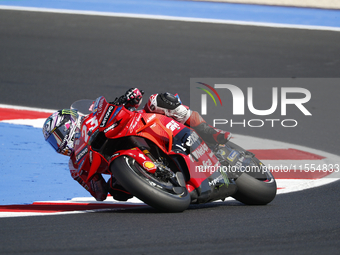 Ducati Spanish rider Jorge Martin rides ahead of Ducati Italian rider Francesco Bagnaia during the sprint race of the San Marino MotoGP Gran...