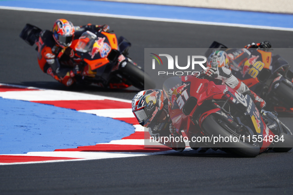 Ducati Spanish rider Jorge Martin rides ahead of Ducati Italian rider Francesco Bagnaia during the sprint race of the San Marino MotoGP Gran...