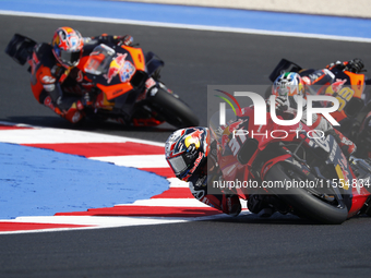 Ducati Spanish rider Jorge Martin rides ahead of Ducati Italian rider Francesco Bagnaia during the sprint race of the San Marino MotoGP Gran...