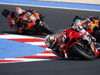 Ducati Spanish rider Jorge Martin rides ahead of Ducati Italian rider Francesco Bagnaia during the sprint race of the San Marino MotoGP Gran...