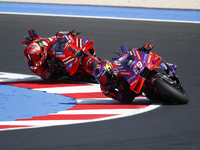 Ducati Spanish rider Jorge Martin rides ahead of Ducati Italian rider Francesco Bagnaia during the sprint race of the San Marino MotoGP Gran...