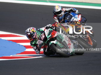 Ducati Spanish rider Jorge Martin rides ahead of Ducati Italian rider Francesco Bagnaia during the sprint race of the San Marino MotoGP Gran...