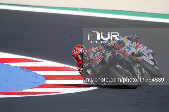 Ducati Spanish rider Jorge Martin rides ahead of Ducati Italian rider Francesco Bagnaia during the sprint race of the San Marino MotoGP Gran...