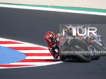 Ducati Spanish rider Jorge Martin rides ahead of Ducati Italian rider Francesco Bagnaia during the sprint race of the San Marino MotoGP Gran...