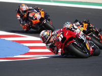 Ducati Spanish rider Jorge Martin rides ahead of Ducati Italian rider Francesco Bagnaia during the sprint race of the San Marino MotoGP Gran...