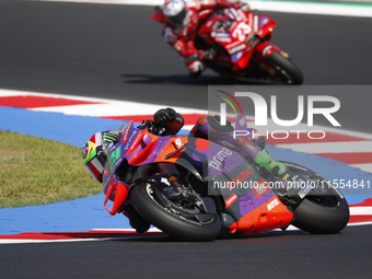 Ducati Spanish rider Jorge Martin rides ahead of Ducati Italian rider Francesco Bagnaia during the sprint race of the San Marino MotoGP Gran...