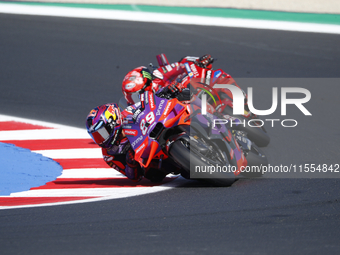 Ducati Spanish rider Jorge Martin rides ahead of Ducati Italian rider Francesco Bagnaia during the sprint race of the San Marino MotoGP Gran...