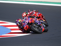 Ducati Spanish rider Jorge Martin rides ahead of Ducati Italian rider Francesco Bagnaia during the sprint race of the San Marino MotoGP Gran...