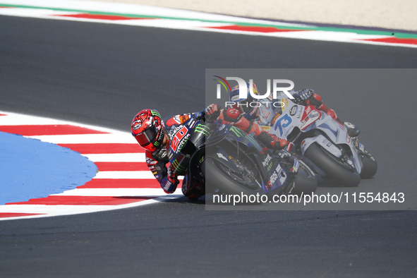 Ducati Spanish rider Jorge Martin rides ahead of Ducati Italian rider Francesco Bagnaia during the sprint race of the San Marino MotoGP Gran...