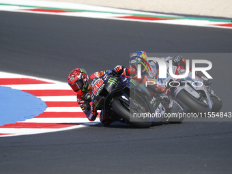 Ducati Spanish rider Jorge Martin rides ahead of Ducati Italian rider Francesco Bagnaia during the sprint race of the San Marino MotoGP Gran...