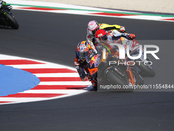 Ducati Spanish rider Jorge Martin rides ahead of Ducati Italian rider Francesco Bagnaia during the sprint race of the San Marino MotoGP Gran...