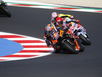 Ducati Spanish rider Jorge Martin rides ahead of Ducati Italian rider Francesco Bagnaia during the sprint race of the San Marino MotoGP Gran...