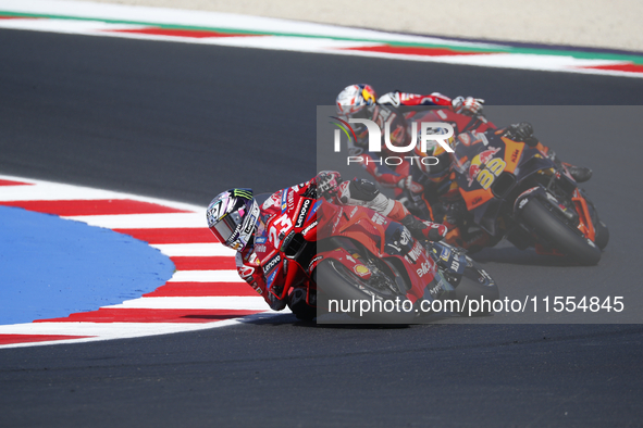 Ducati Spanish rider Jorge Martin rides ahead of Ducati Italian rider Francesco Bagnaia during the sprint race of the San Marino MotoGP Gran...