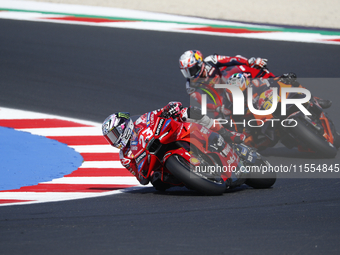 Ducati Spanish rider Jorge Martin rides ahead of Ducati Italian rider Francesco Bagnaia during the sprint race of the San Marino MotoGP Gran...