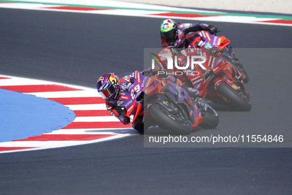 Ducati Spanish rider Jorge Martin rides ahead of Ducati Italian rider Francesco Bagnaia during the sprint race of the San Marino MotoGP Gran...