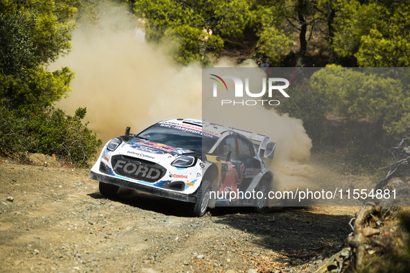 Driver Adrien Fourmaux and co-driver Alexandre Coria of the team M-Sport Ford World Rally Team Ford Puma Rally1 Hybrid face the second day o...