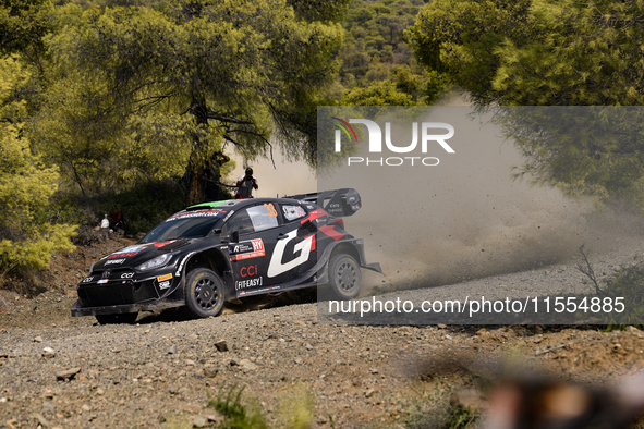 Driver Elfyn Evans and co-driver Scott Martin of the team Toyota Gazoo Racing WRT, in a Toyota GR Yaris Rally1 Hybrid, face the second day o...