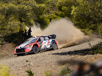 Driver Ott Tanak and co-driver Martin Jarveoja of the Hyundai Shell Mobis World Rally Team, in the Hyundai i20 N Rally1 Hybrid, face the sec...