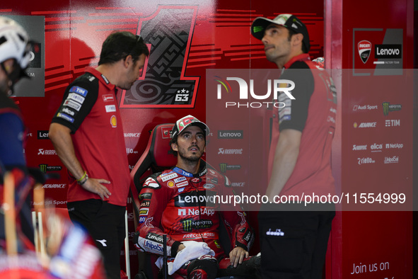 Francesco Bagnaia of Italy and Ducati Lenovo Team looks on at the box during the Qualify of MotoGP of San Marino at Misano World Circuit in...