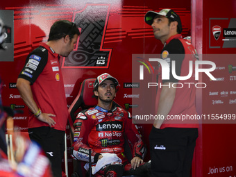 Francesco Bagnaia of Italy and Ducati Lenovo Team looks on at the box during the Qualify of MotoGP of San Marino at Misano World Circuit in...