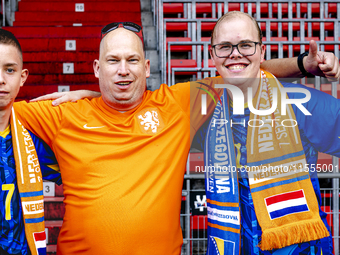 Supporters of the Netherlands and supporters of Bosnia and Herzegovina during the match between the Netherlands and Bosnia and Herzegovina a...