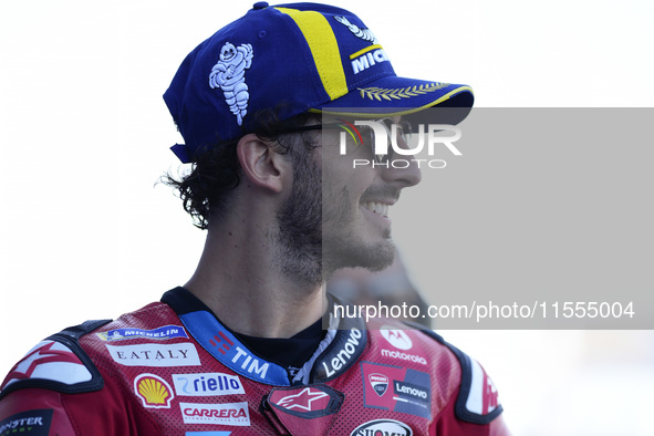 Francesco Bagnaia of Italy and Ducati Lenovo Team celebrates the best time scored during the Qualify of MotoGP Of San Marino at Misano World...