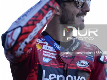 Francesco Bagnaia of Italy and Ducati Lenovo Team celebrates the best time scored during the Qualify of MotoGP Of San Marino at Misano World...