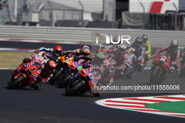 Jorge Martin of Spain and Prima Pramac Racing rides on track in front of Francesco Bagnaia of Italy and Ducati Lenovo Team during the Sprint...