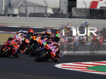 Jorge Martin of Spain and Prima Pramac Racing rides on track in front of Francesco Bagnaia of Italy and Ducati Lenovo Team during the Sprint...