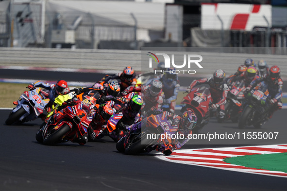 Jorge Martin of Spain and Prima Pramac Racing rides on track in front of Francesco Bagnaia of Italy and Ducati Lenovo Team during the Sprint...