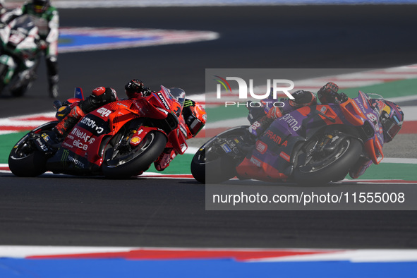 Jorge Martin of Spain and Prima Pramac Racing rides on track in front of Francesco Bagnaia of Italy and Ducati Lenovo Team during the Sprint...