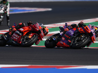 Jorge Martin of Spain and Prima Pramac Racing rides on track in front of Francesco Bagnaia of Italy and Ducati Lenovo Team during the Sprint...